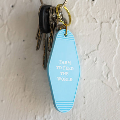 "Farm to Feed the World" Motel Keychain - Baby Blue